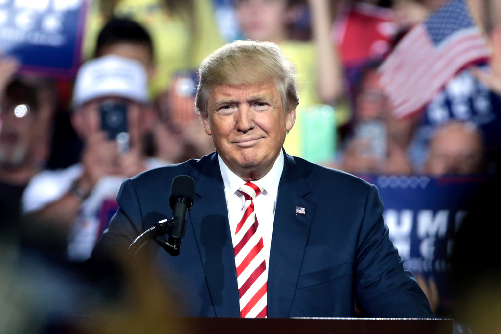 Donald Trump speaking with supporters at a campaign rally at the Prescott Valley Event Center in Prescott Valley, Arizona. Trump is opposed to DACA and is in favor of a comprehensive immigration plan.