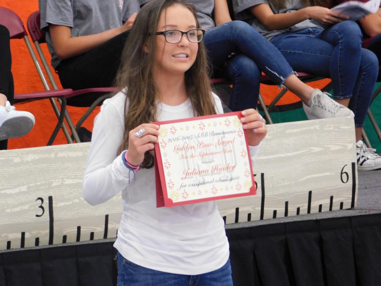 Sophomore Juliana Haider receives the Golden Pow Award.