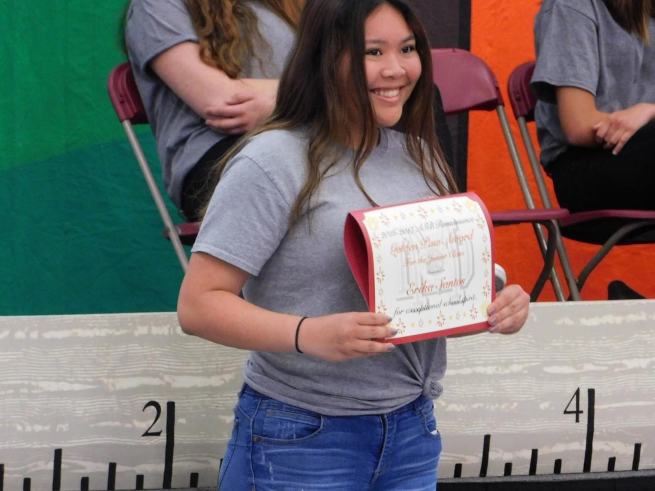Junior Erika Santos receives the Golden Pow Award. 