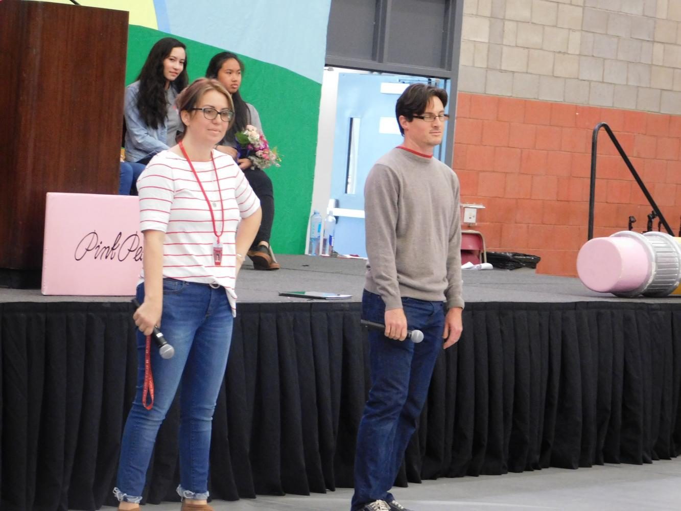 Jill Cavotta and Rick Thompson wait for their turn to create a funny Improv scene. 