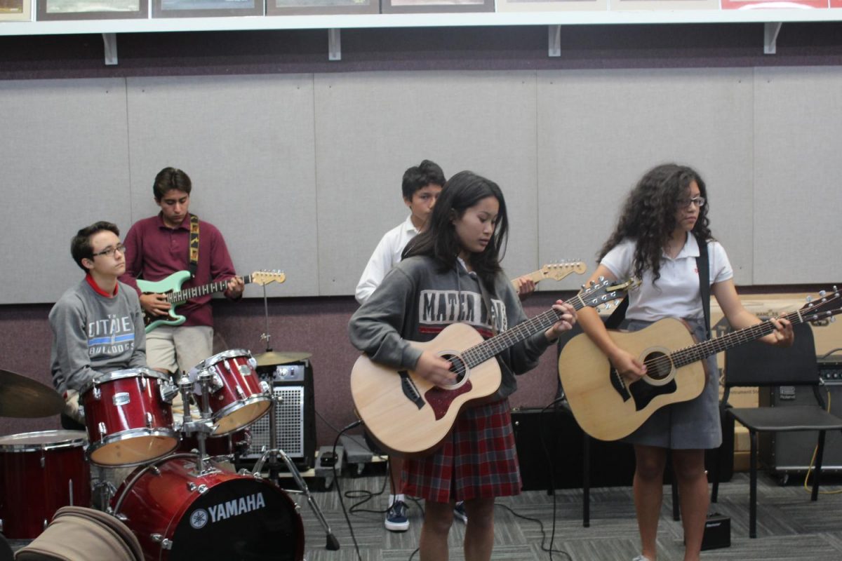 Block 4 students practice the song Zombie by The Cranberries for their upcoming Halloween show.