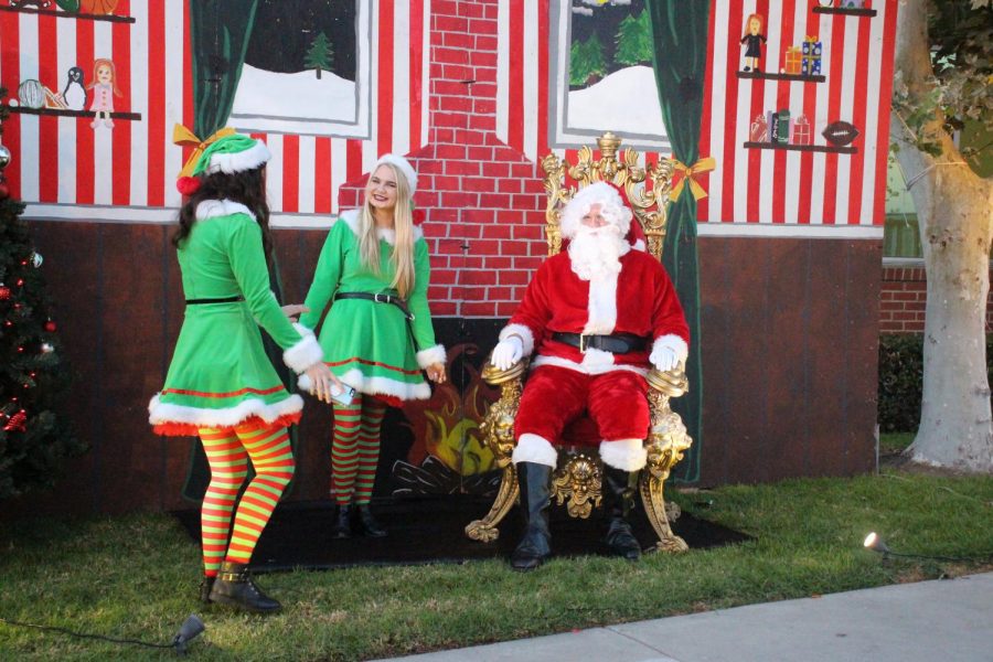 Santa and his elves getting ready for Christmas at the Corner to greet all of the kids.