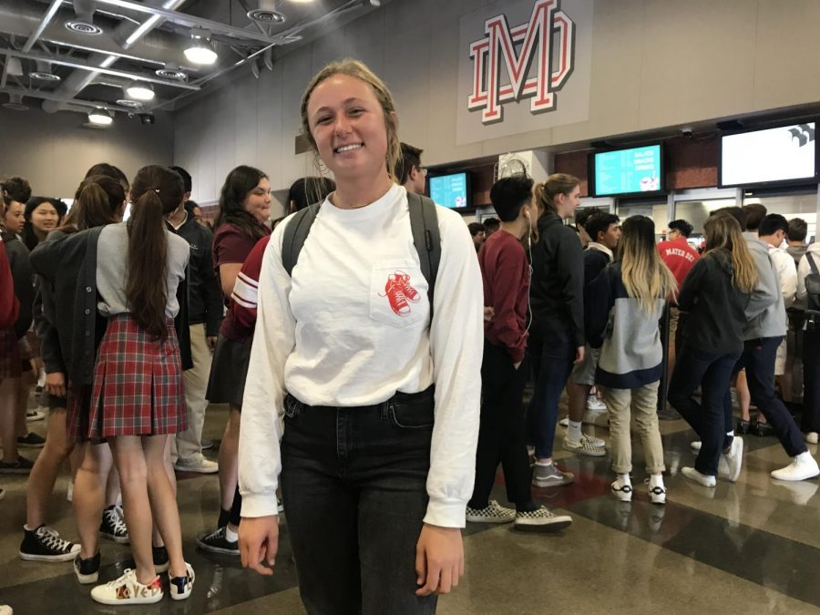 Junior Elena VanEnenam represents the Thoughtful Thrifting club during upper lunch. Thoughtful Thrifting donates used and old clothing to local thrift shops.