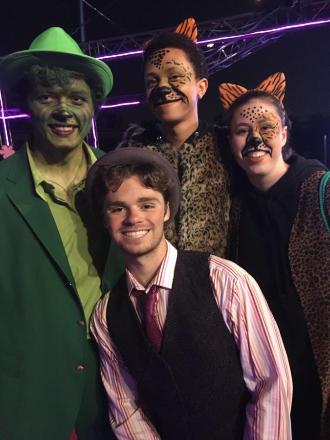 (Left to Right) Seniors Aiden Mulholland, Jagari Jennings, Jack Chorbagian and Michaela Maguin pose after a performance.