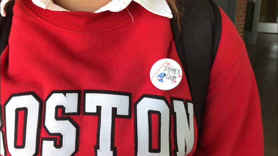 Freshman Marcela Cid-Rosas wears one of the Disney Clubs monthly special buttons designed by senior Megan Rood. This button featured a Lilo & Stich theme. Im always looking forward to see the new pins, Cid-Rosas said. Theyre always so adorable.