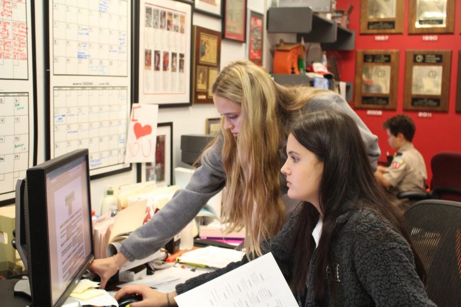 COACH’S ORDERS: Juniors Kyla Martinsen and Sofia Zerza work together  during their block 8 to create the rooming list for the varsity boys basketball tournament that will take place in Santa Barbara. Tasks like this are standard for the team managers. “Coach will write stuff up for us, and then we basically type them into a computer and print them out," Zerza said. Many team managers hope to pursue athletic management in the future. “I would love to be an administrative assistant for basketball in college," Martinsen said. “I have always been a huge basketball fan. This job has helped me learn all the technical sides of the sport."