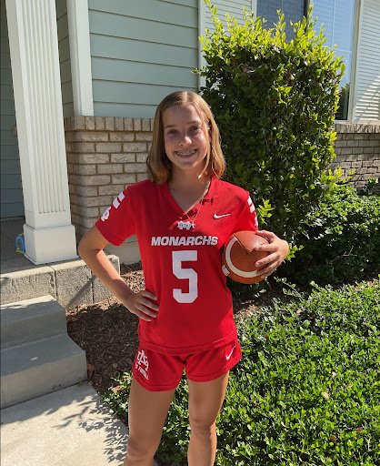 FRESHMAN WITH CONFIDENCE AND COMMITMENT Kendra Hansen poses in her new Monarch uniform.  She is one of many new hard-working athletes on the Flag Football Team.