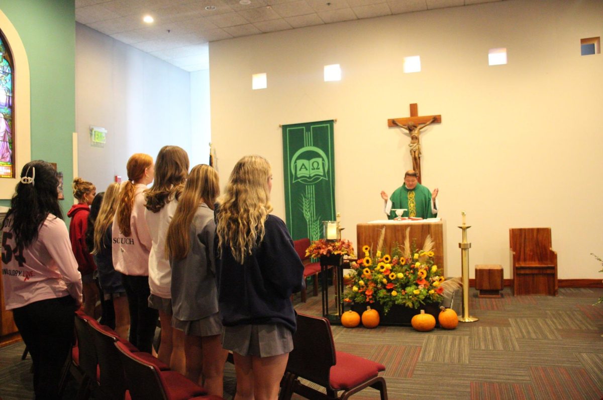 BEING WITH CHRIST Mater Dei Chaplain Father Mark Cruz offers daily Mass During most lunches in the Mater Dei Chapel for the first 20 minutes of both upper and lower lunches. This helps students become closer to God by celebrating together through liturgy and the Eucharist. Campus Ministry helps foster this by creating a nurturing, supporting environment to let students self grow in their faith. “The community and campus ministry is super accepting and welcoming, and I really appreciate having a kind of second home on campus through the campus ministry program,” De Leon said. “There's also a lot of fellowship through worship, prayer services, prayer opportunities, and a lot of service that we get to do with their peers as well.”