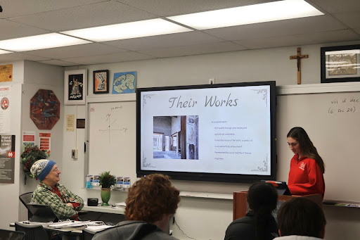 LATIN ON ANOTHER LEVEL Senior Maya Fischbein presents her project on the Vettii Brothers, who were freedmen in the Roman Empire. In Honors Latin 4, several students are assigned to present information on various prominent members of Ancient Roman society. Fischbein developed a presentation on the Vettii Brothers, two freedmen who worked their way up through Roman society despite their circumstances. This unit was paired with the study of fables, which Fischbein enjoys because they remind her of her childhood. “My favorite thing so far is learning about the fables,” Fischbein said. “I remember these stories from when I was younger, so it is interesting to learn their origins and translations.” 