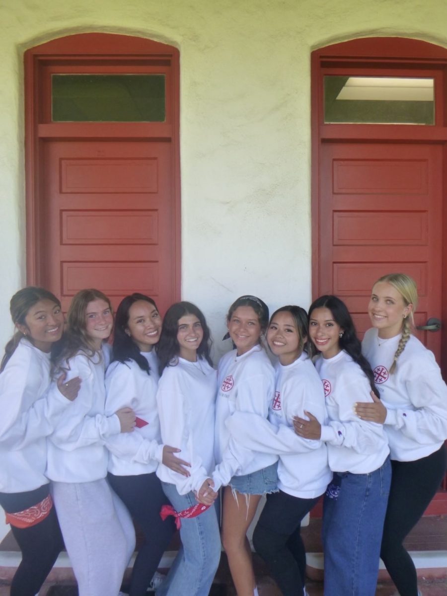 SISTERHOOD WITH FAITH Senior Angelina Arciaga (far left) stands alongside her friends as they take a photo to preserve their time on the senior retreat. The three day retreat serves as a reminder to stay faithful, offering students time away from campus to strengthen their relationship with God and create deeper relationships with their peers. Through reflection, activities, and shared moments, seniors are encouraged to pause and reflect before they graduate and grow into adulthood. “It was so great to see them outside of the classroom [and] it's so great to get to know them outside of the classroom,” Department Chair of Religious Studies Elizabeth Rosales said. “Next time you see the same students on campus, you have a totally different relationship.” Photo courtesy of Angelina Arciaga. 