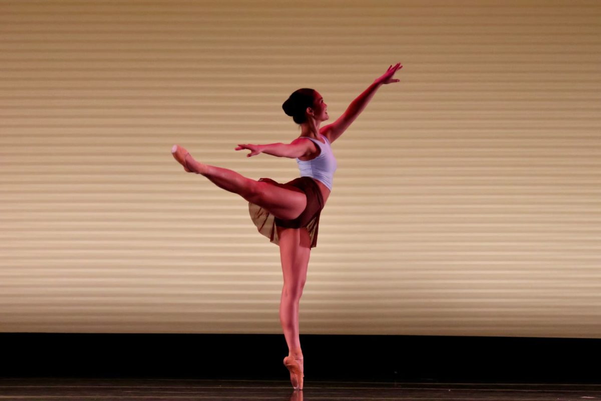 TIPPY TOES Senior Bella Dinglasan performs a solo performance onstage during the recent ONE Concert. Since summer of 2025, the Dance Conservatory Team has been working hard and mastering dance moves to perform at their best onstage. Led by Director of Dance Rochele Mapes, members of the conservatory have gained not only artistic dancing skills, but also friendships that may last a lifetime. “There's something really incredible about somebody coming in at a certain skill level and being able to transform them and [find out] what they're physically able to do,” Mapes said. “[Every dancer] gets this well rounded, versatile experience of being on a team but the training and performance part of being in a conservatory.” 